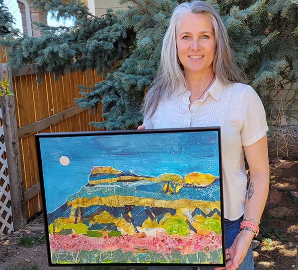 paula with landscape painting after kellie day art class
